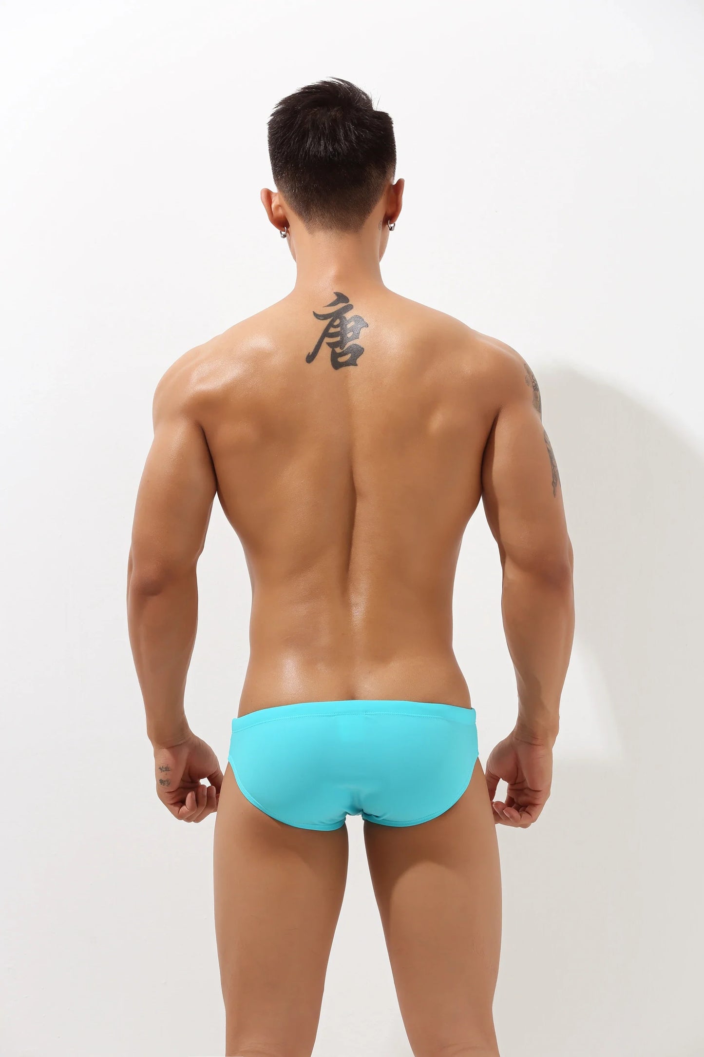 Sexy Low-Rise Swim Briefs for Men with Hollow Design
