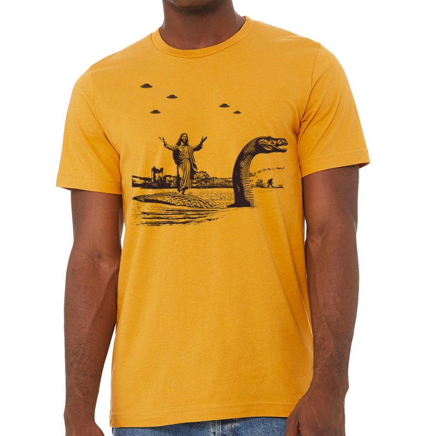 Jesus Christ Riding The Loch Ness Monster Men's Tshirt | Guys Funny Dinosaur Tee | Humorous Religious Tee with Jesus and Nessie